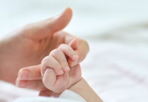 Surrogacy in Mexico - holding hands